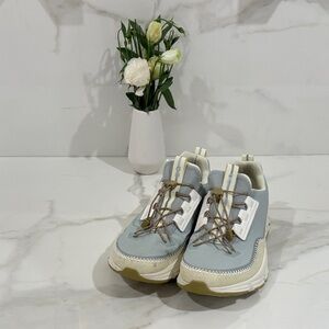 On Running Light Blue and White Sneakers